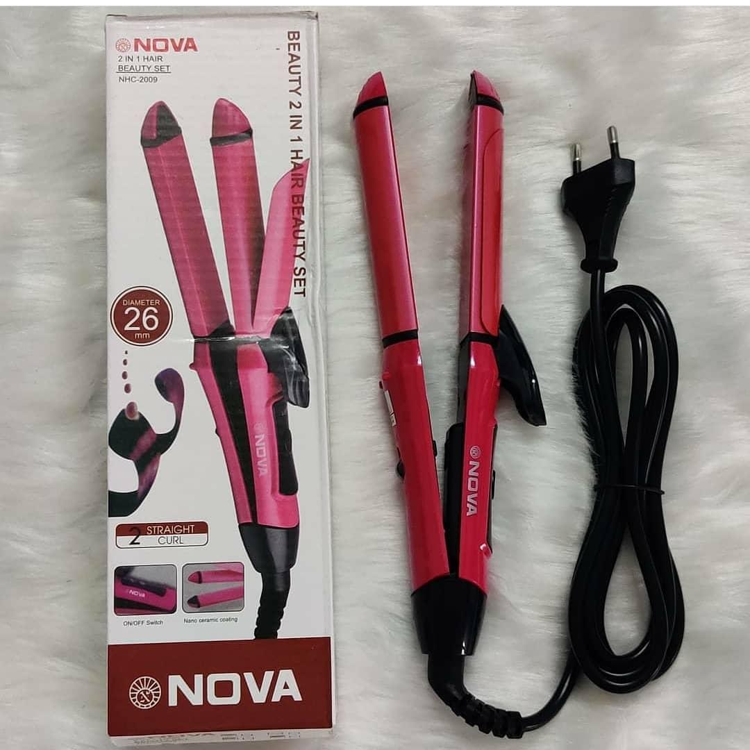 Introducing the 2 in 1 Hair Straightener and Curler, your ultimate styling tool for creating versatile looks with ease. Brought to you by Nano Smart Store, this innovative device combines the functionalities of a hair straightener and a curling iron, allowing you to switch up your hairstyle effortlessly. Experience the convenience of the 2 in 1 Hair Straightener and Curler. With its dual-function design, you can achieve sleek, straight hair or bouncy, beautiful curls using just one tool. Say goodbye to cluttered countertops and multiple styling tools - this versatile device has got you covered. Create flawless hairstyles with the 2 in 1 Hair Straightener and Curler. It features high-quality ceramic plates that glide smoothly through your hair, evenly distributing heat for consistent results. The adjustable temperature settings allow you to customize the heat according to your hair type, ensuring optimal styling without causing damage. Switching between straightening and curling is a breeze with the 2 in 1 Hair Straightener and Curler. The rounded barrel and curved edges enable you to create different curl sizes and styles, from loose waves to tight coils. Experiment with various looks and transform your hair effortlessly for any occasion. Designed with user convenience in mind, the 2 in 1 Hair Straightener and Curler heats up quickly, saving you time in your busy routine. The lightweight and ergonomic design make it comfortable to hold and maneuver, reducing strain on your wrists and ensuring precise styling. Upgrade your hairstyling game with the 2 in 1 Hair Straightener and Curler from Nano Smart Store. Embrace versatility and creativity as you effortlessly transform your hair into sleek and straight or voluminous and curly styles. This all-in-one styling tool is a must-have for achieving salon-quality results at home. Experience the best of both worlds with Nano Smart Store's 2 in 1 Hair Straightener and Curler!